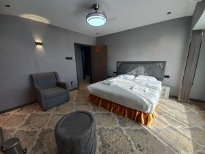 Book the Double Room Sur Hotel Oman, a compact 9 m² private room with one double bed, private bathroom, air conditioning, and space for two adults.
